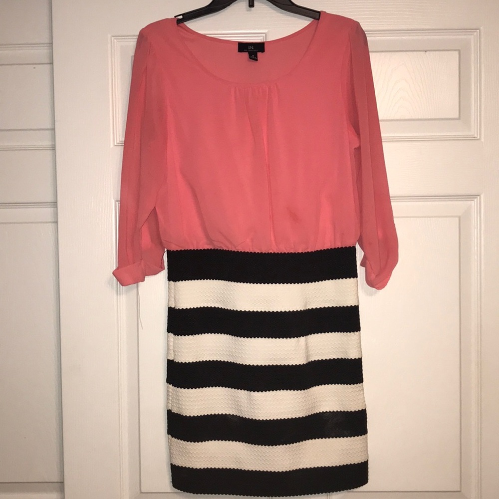 Pink, black and white form fitting dress